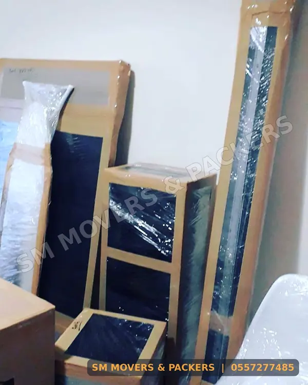Glass furniture protected with cardboard edges