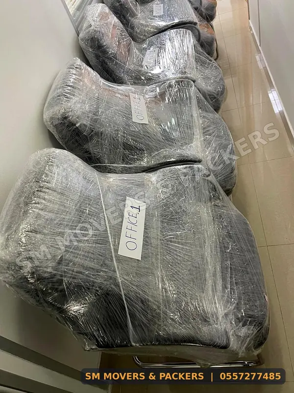 Office chairs wrapped and labelled